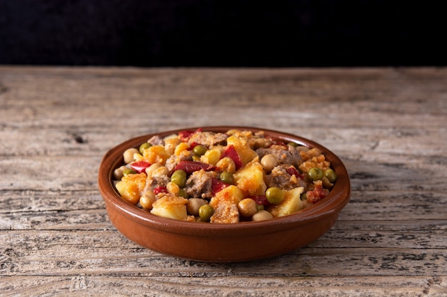 Ropa vieja dish on a wooden table