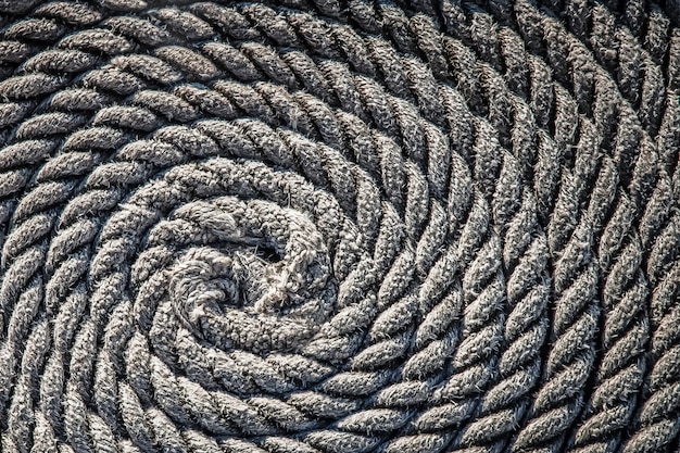 The rope for the boat laid in the form of a spiral background