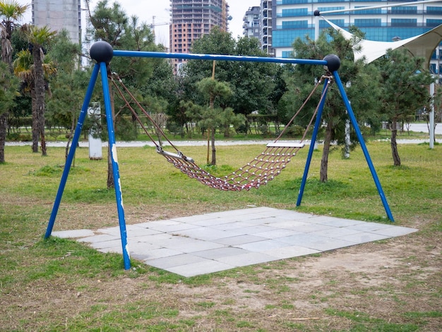 Rope hammock in the city park park infrastructure Place for rest