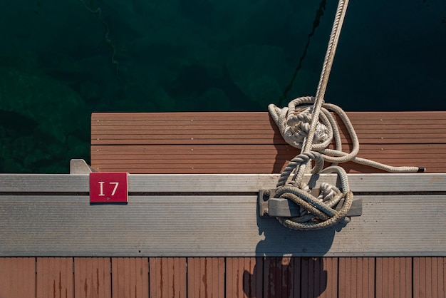 Rope mooring and bollard on the pier