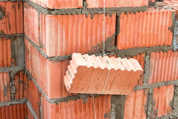 Rope plumb for even brickwork Compliance with the correct laying of walls and corners of ceramic bricks Bricklayer's tool