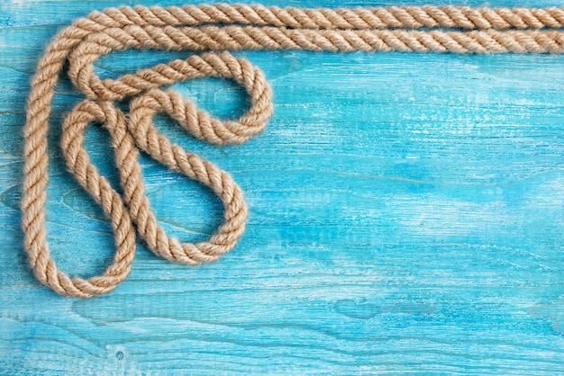 Rope and wooden background