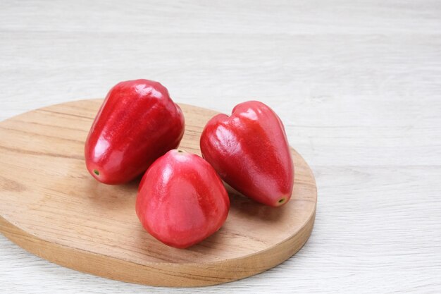 Rose apple (Jambu Air) in bamboo plate, tropical fruit.