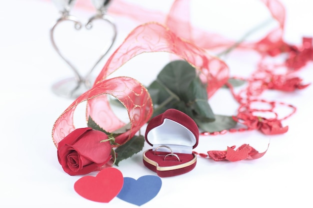 Rose and a box with a ring on a valentines day card photo with