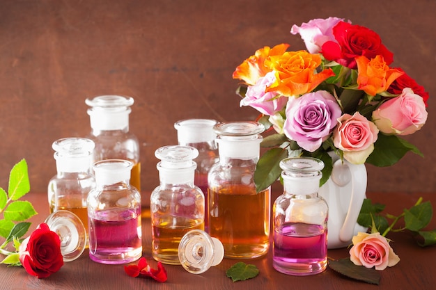 Rose essential oil in glass jars