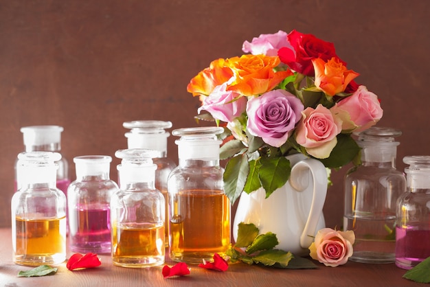 Rose essential oil in glass jars