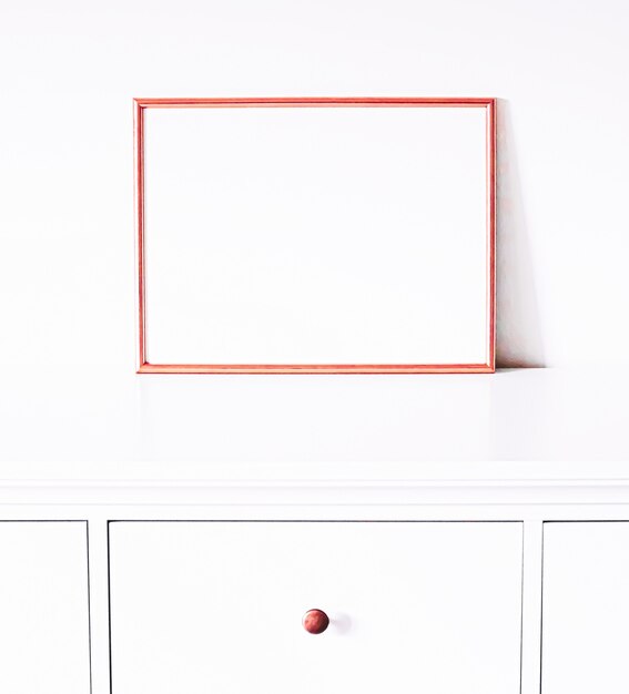 Rose gold frame on white furniture luxury home decor and design for mockup poster print and printabl...