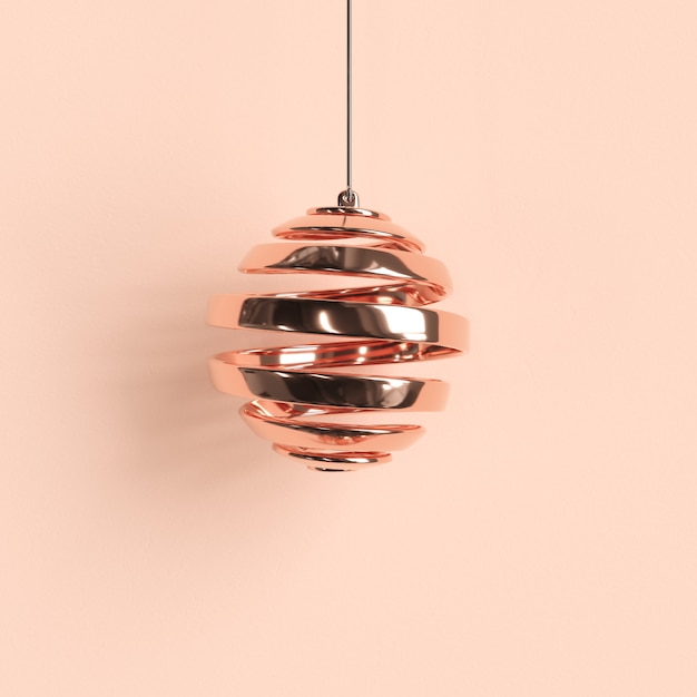 パステル調の背景にバラの金の装飾品クリスマスボール。最小限のクリスマスコンセプトのアイデア。