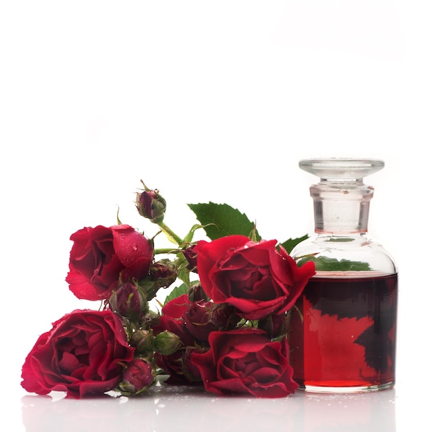 Rose oil and rose flowers