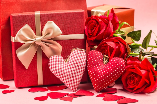 Rose and present gift on wooden background/ Valentines day background