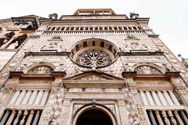 Rose window above the entrance to the colleoni chapel bergamo italy