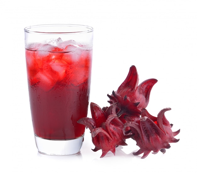 roselle flower juice in glass with ice isolated