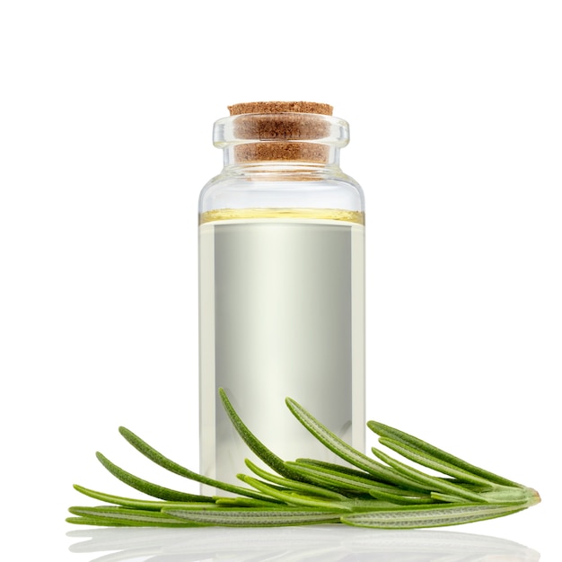 Rosemary essential oil isolated on white