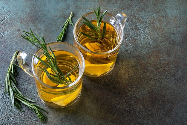 Rosemary tea in two glass cups