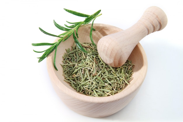 rosemary in the wooden mortar