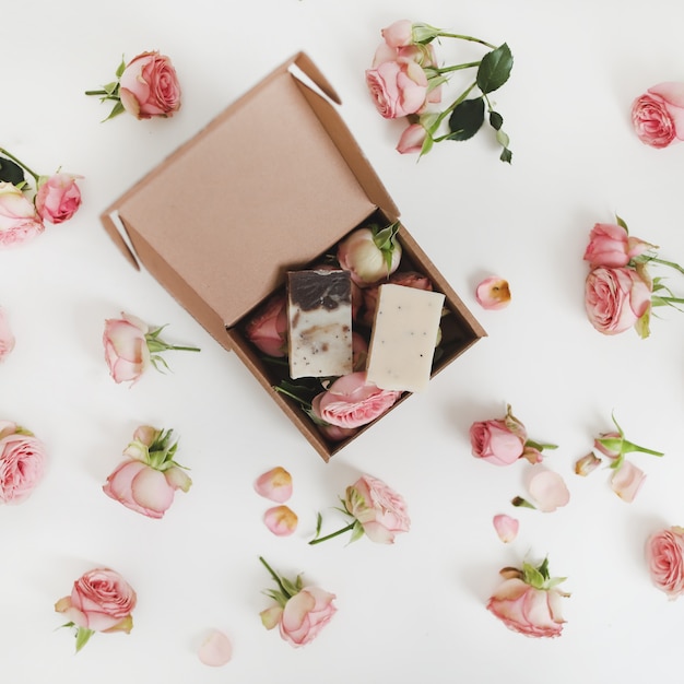 Roses in a box with a floral surface