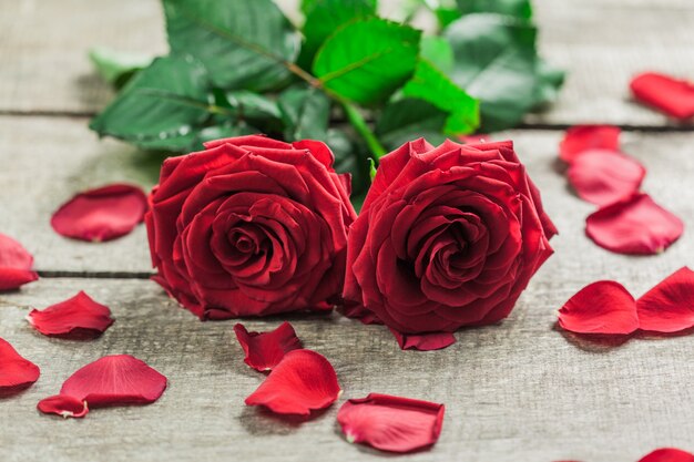 Roses and a hearts on wooden board, Valentines Day background