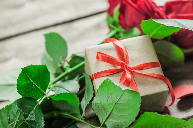 Roses and a hearts on wooden board, Valentines Day 