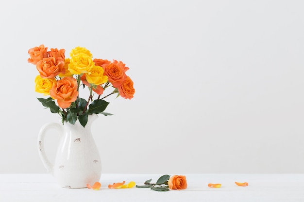 Roses in white jug