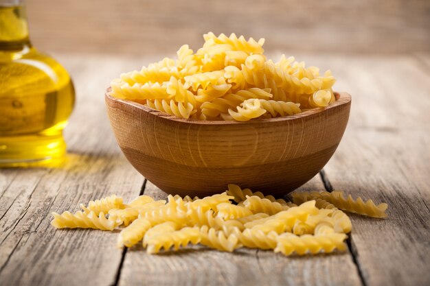 Rotini pasta in wooden bowl