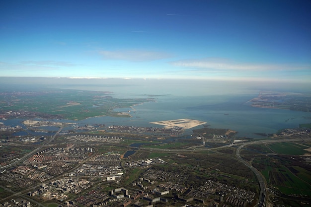 Rotterdam north sea aerial Netherlands holland panorama from airplane before landing to AMsterdam SChipol airport