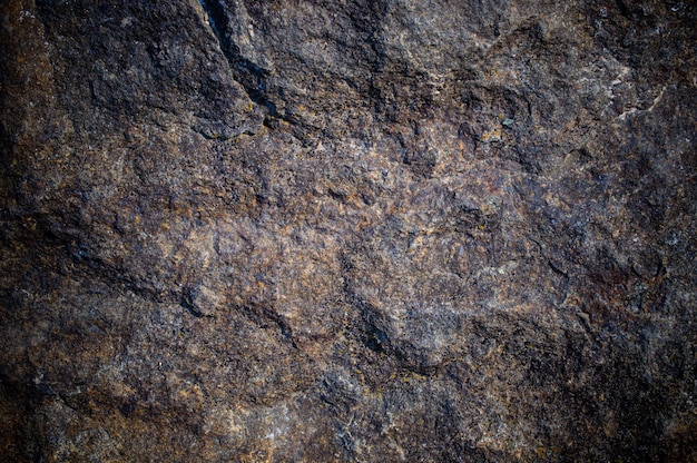 Rough boulder stone texture close up