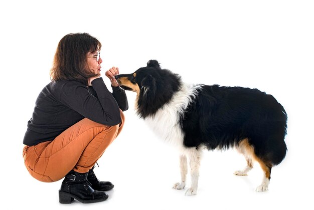 Rough collie and woman