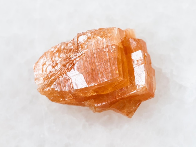 Photo rough crystal of chabazite gemstone on white