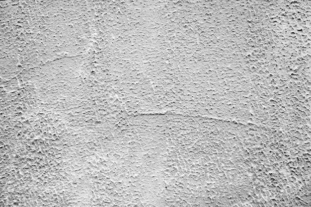 壁の概念または壁のバナーの古いテクスチャの粗い灰色のセメントの背景