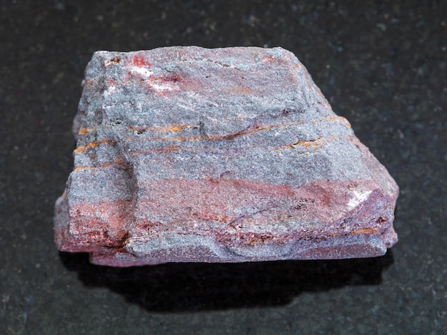 Rough jaspilite ferruginous quartzite on dark