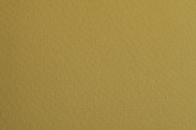 Rough kraft paper background monochrome paper texture dark yellow green color Mockup with copy space for text