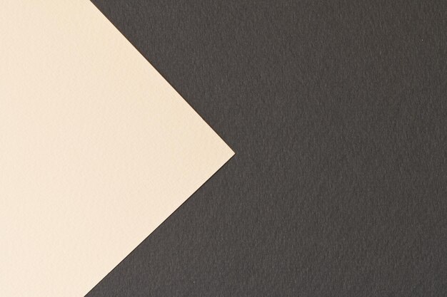Photo rough kraft paper background paper texture black ivory colors mockup with copy space for text