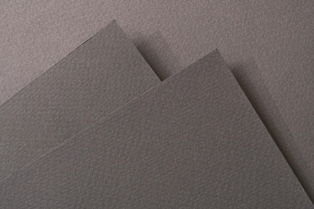 Photo rough kraft paper background paper texture different shades of black grey mockup with copy space for text