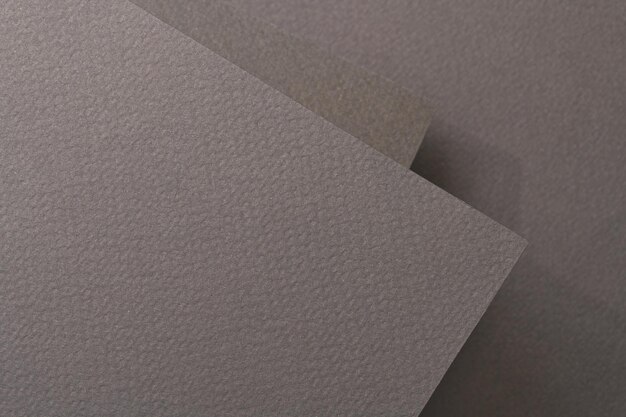 Фото Грубая крафт-бумага фоновая текстура бумаги разные оттенки черного серого макет с копией пространства для текста