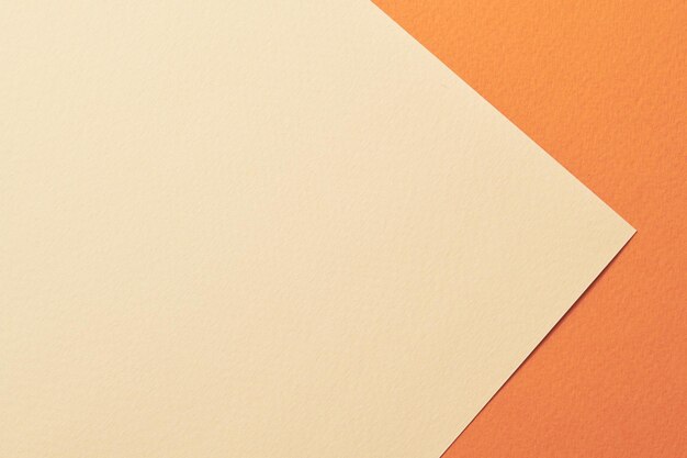 Photo rough kraft paper background paper texture orange beige colors mockup with copy space for text