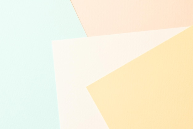 Photo rough kraft paper pieces collage background geometric paper texture pastel colors mockup with copy space for textxa