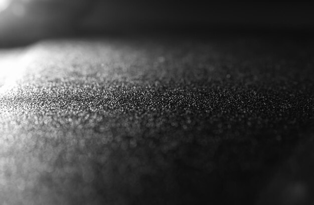 rough leather surface with reflective white color perspective and black background