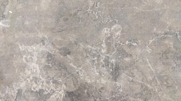 Rough marble stone texture background wall facade of gray cement worn crepis old grey weathered