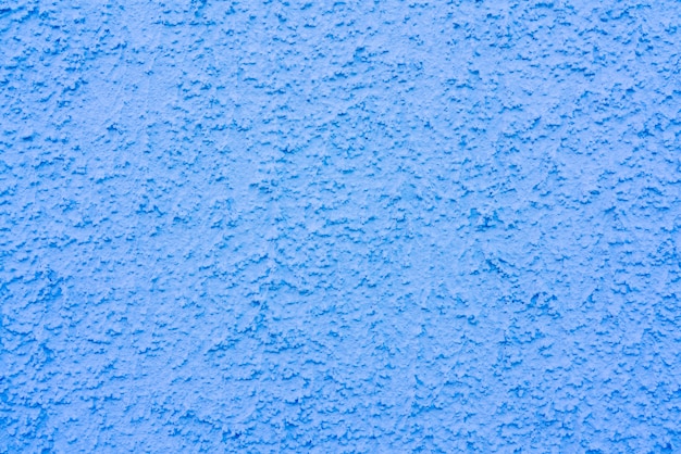 Photo rough stucco texture on the wall.