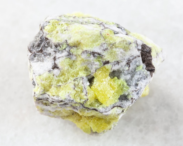 Rough sulfur ore on white