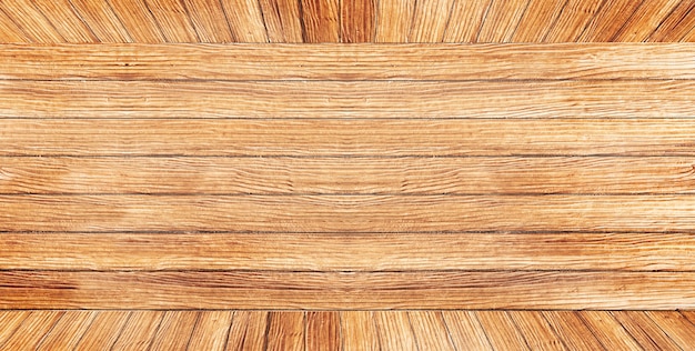 Rough texture of long brown wooden wall