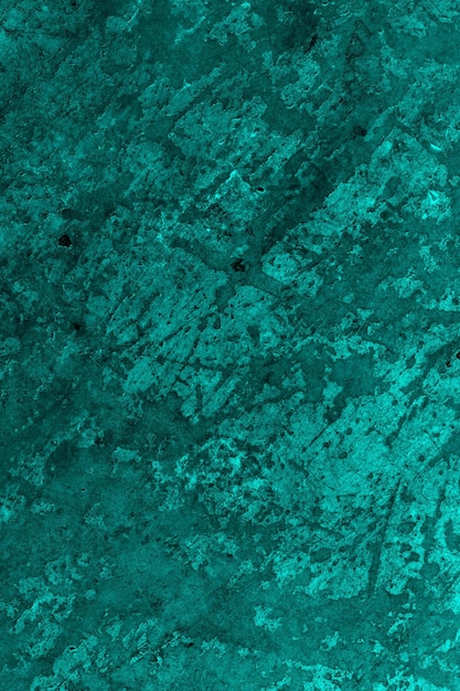 Photo rough textured dark cyan color old metal sheet for background