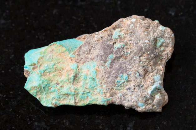 Rough Turquoise gemstone on dark background