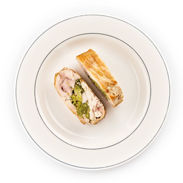 Roulade of chicken. Chicken breast stuffed with herbs.