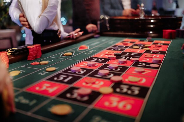 Roulette game players place bets high quality photo