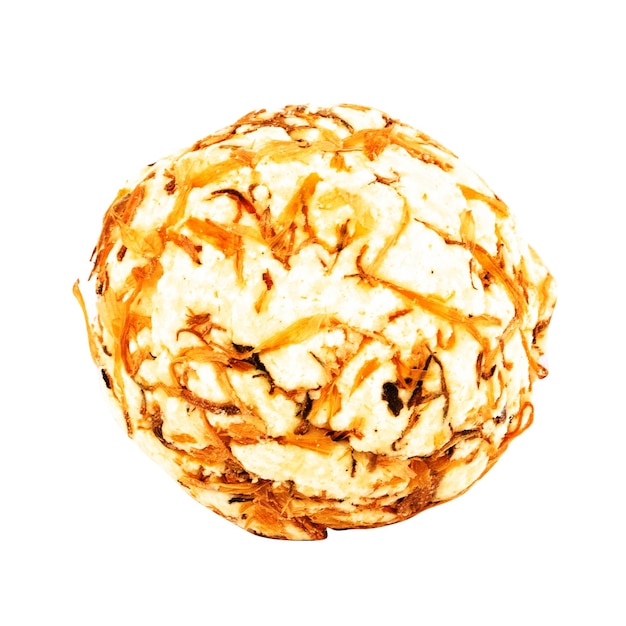 A round ball with caramel on it