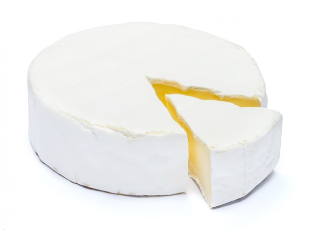 Photo round brie or camambert cheese on a white table