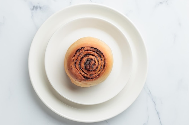 Round buns with poppy seeds