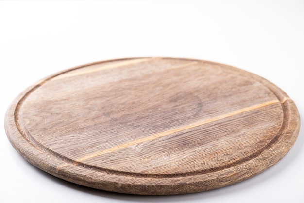 Round cutting board idolated on white