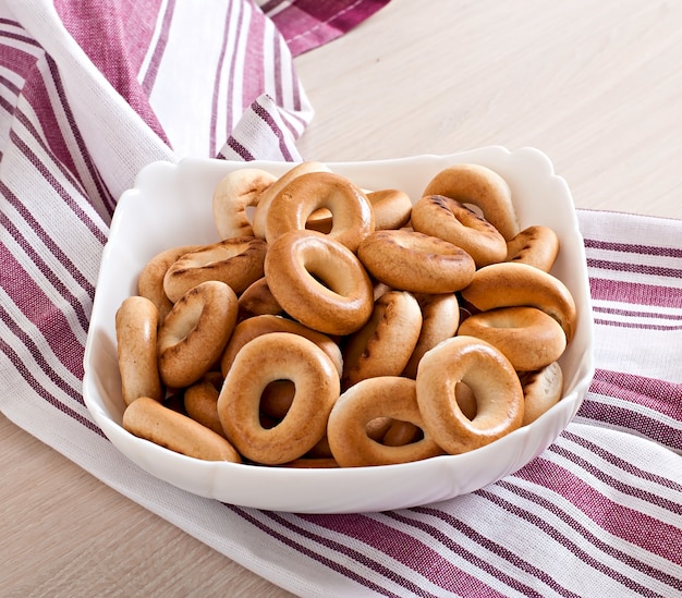 Round dough pieces on a white bowl